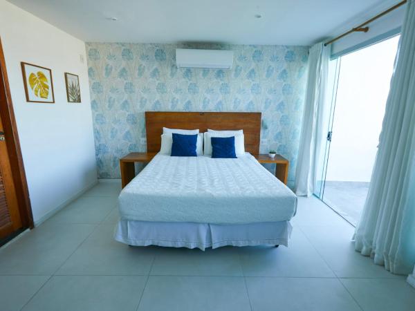 Santa Vista Rio : photo 10 de la chambre suite lit queen-size avec baignoire spa