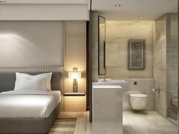 Courtyard by Marriott Ahmedabad Sindhu Bhavan Road : photo 3 de la chambre deluxe guest room with 2 twin/single bed(s) also with 20% discount on spa services