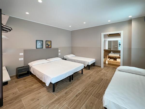 M14 RESIDENZA BASSANELLO : photo 8 de la chambre chambre familiale avec salle de bains privative