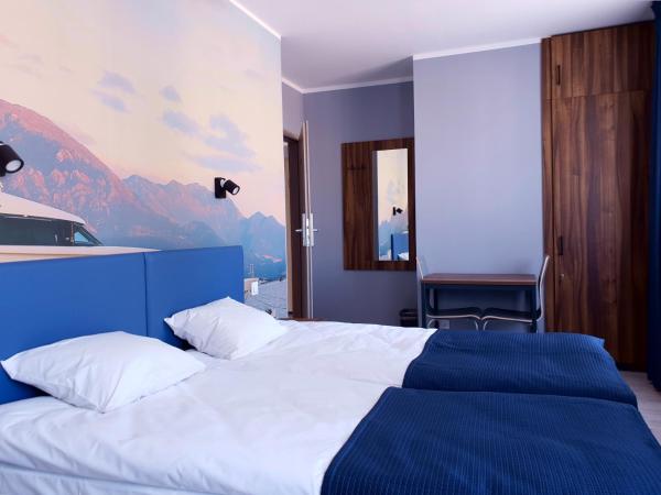 Hostel Annamarie : photo 4 de la chambre chambre quadruple avec salle de bains commune