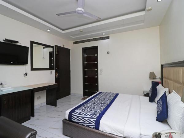 Super Collection O 980 Hotel Ramhan : photo 8 de la chambre chambre triple classique