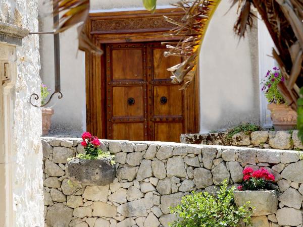 Villa Dei Papiri Fonte Ciane : photo 5 de la chambre chambre double standard - vue sur jardin