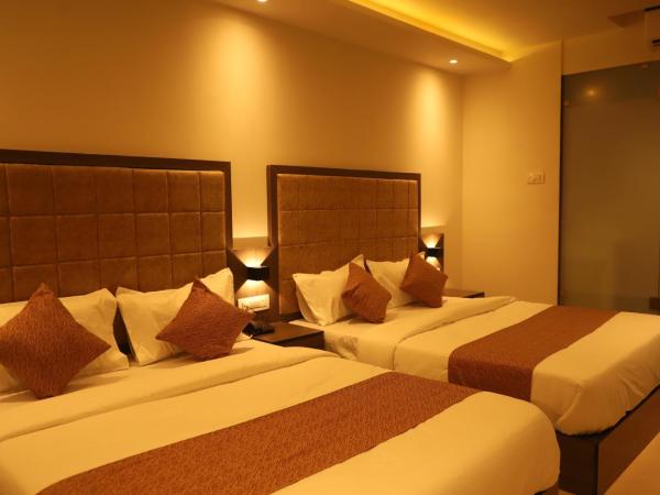 Hotel Sai Pritam : photo 2 de la chambre chambre quadruple avec salle de bains privative