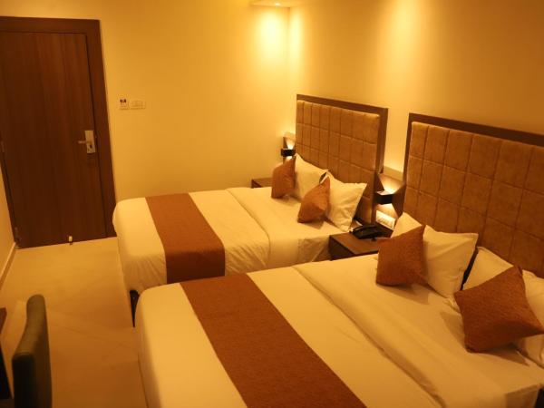 Hotel Sai Pritam : photo 8 de la chambre chambre quadruple avec salle de bains privative