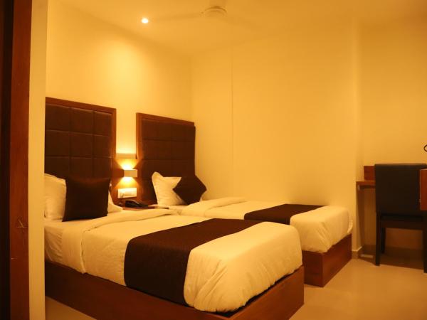 Hotel Sai Pritam : photo 3 de la chambre chambre lits jumeaux avec salle de bains privative