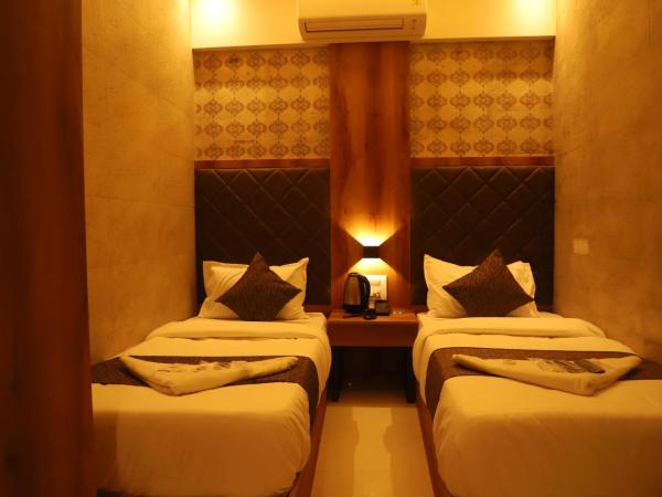 Hotel Sai Pritam : photo 7 de la chambre chambre lits jumeaux avec salle de bains privative