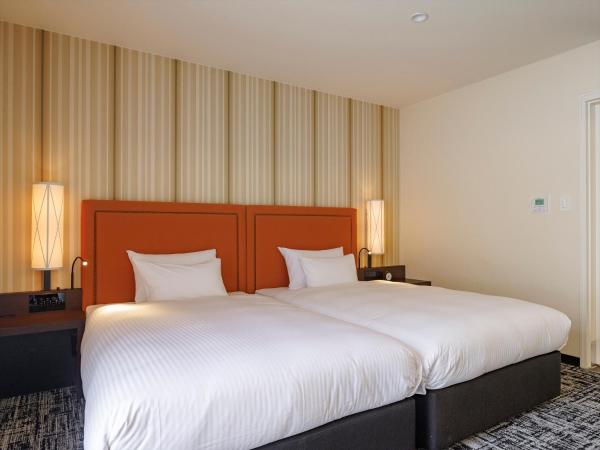 JR Kyushu Hotel Blossom Fukuoka : photo 6 de la chambre deluxe twin room (2 adult) - non-smoking
