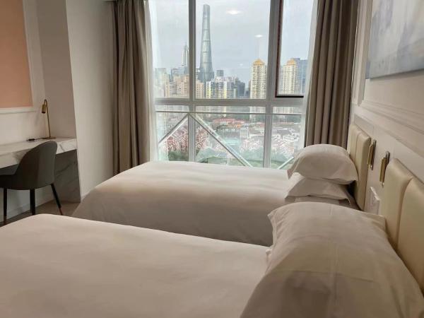 Magnificent International Hotel : photo 2 de la chambre chambre lits jumeaux deluxe