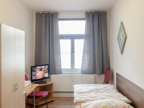 Pension Klingenstr. 23 : photo 5 de la chambre chambre lits jumeaux avec salle de bains commune