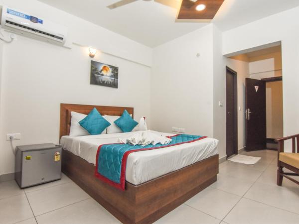 Suraksha Stay Whitefield Hotel : photo 10 de la chambre chambre double deluxe avec vue sur château