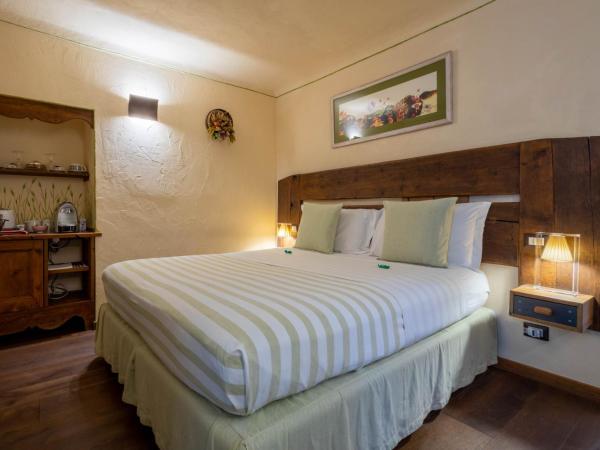 Domus Antica Aosta : photo 2 de la chambre chambre double supérieure avec balcon