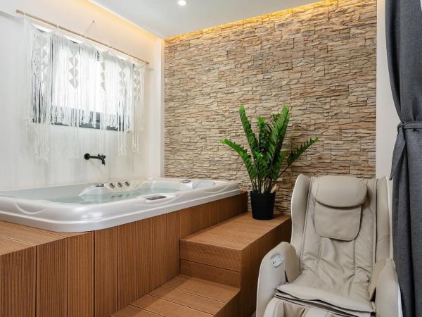 Legato Spa Suites : photo 10 de la chambre one bedroom well-being spa suite with hot tub