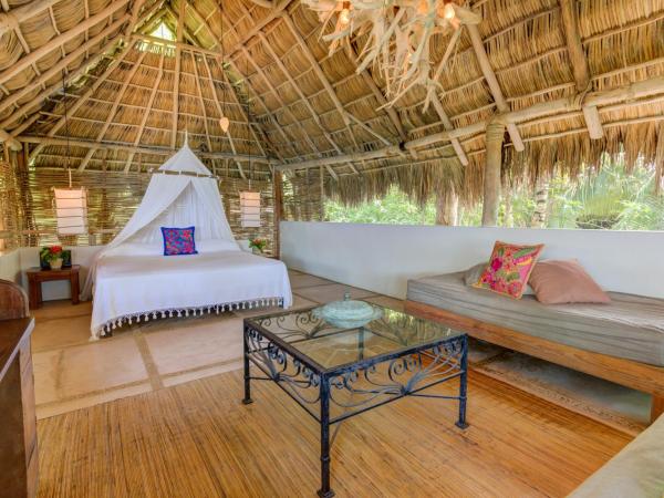 Casitas Maraika : photo 4 de la chambre chambre double ou lits jumeaux deluxe - vue sur mer