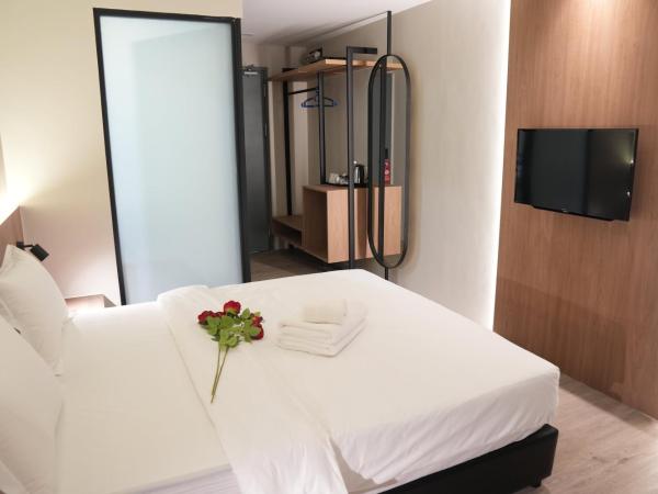 Roxy Hotel Aiman : photo 1 de la chambre chambre supérieure lit queen-size