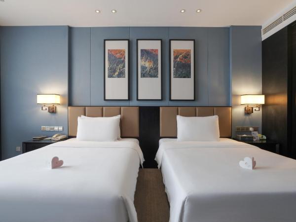 Chongqing Hilman Homeful Hotel : photo 2 de la chambre chambre lits jumeaux deluxe