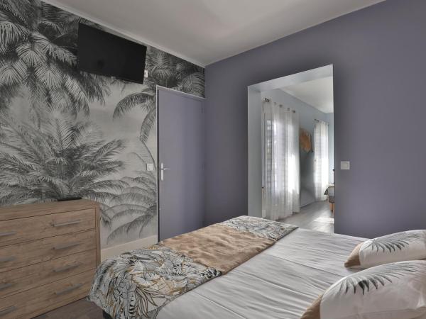 Hotel du Cap : photo 3 de la chambre grande chambre familiale avec balcon - vue sur jardin