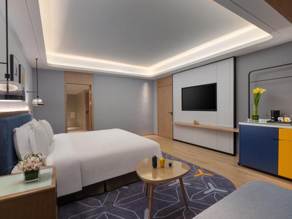 voco Guangzhou Shifu, an IHG Hotel : photo 1 de la chambre 1 king one-bedroom suite living area