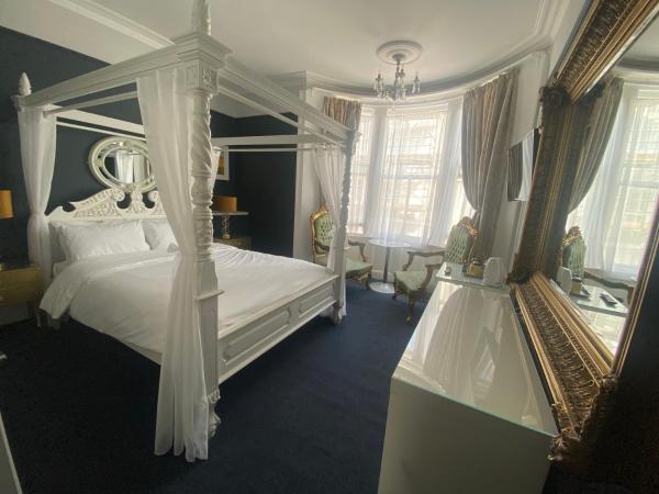 Blue Sky Guest House : photo 1 de la chambre chambre lit king-size