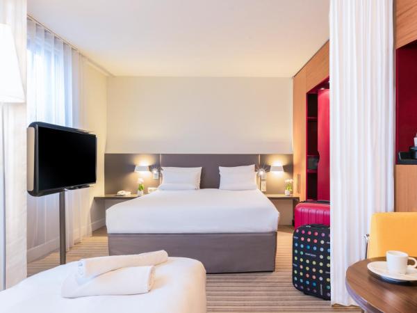 Novotel Suites Cannes Centre : photo 1 de la chambre suite supérieure avec lit queen-size et lit simple 
