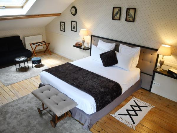 Les bergeronnettes - Chambres d'Hôtes Bergerac : photo 1 de la chambre chambre triple - vue sur jardin