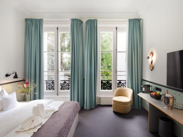 Aussen Alster Hotel : photo 2 de la chambre chambre double - vue sur jardin