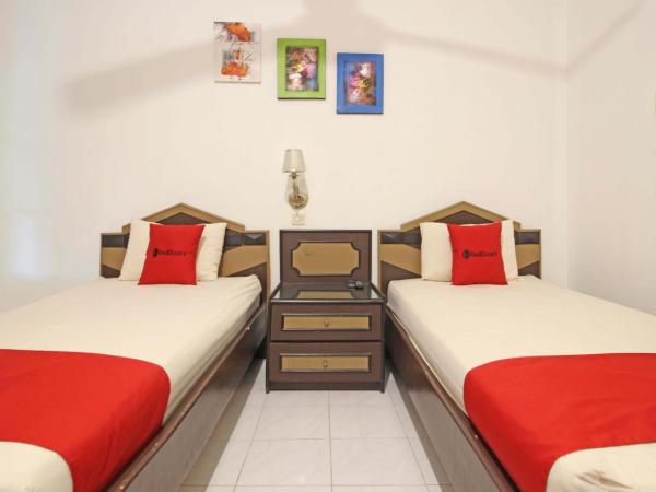 RedDoorz near Pojok Beteng Prawirotaman : photo 4 de la chambre chambre lits jumeaux