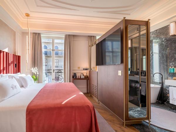 Palacio Gran Vía, a Royal Hideaway Hotel : photo 7 de la chambre chambre double deluxe - vue sur ville