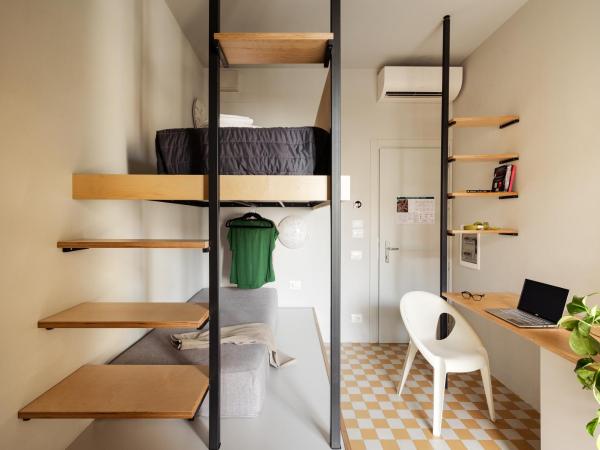 'RE-Dama Hostel : photo 4 de la chambre chambre lits jumeaux Économique