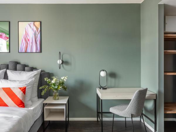 numa I Boxer Rooms and Apartments : photo 7 de la chambre large studio with kitchenette