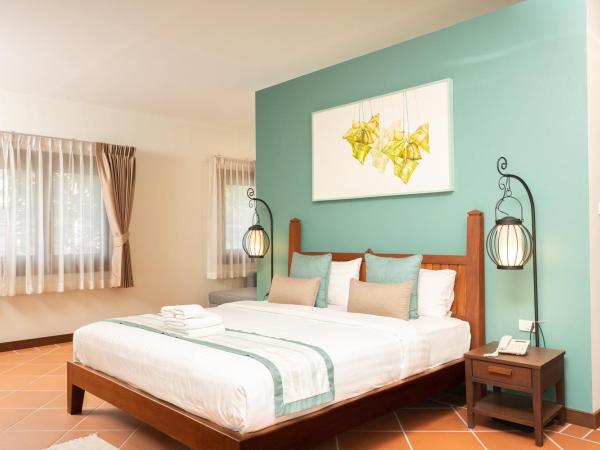 Villa Sanpakoi : photo 2 de la chambre suite lit king-size junior - vue sur rue