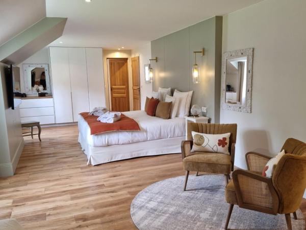 Au Moulin Saint Nicol - Honfleur : photo 5 de la chambre chambre 3 : suite deluxe avec douche et baignoire - vue sur jardin et fleuve