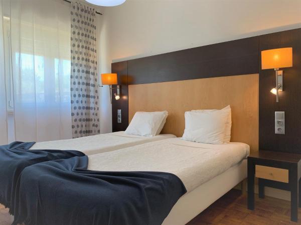 Discovery Apartment Benfica : photo 7 de la chambre chambre familiale
