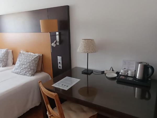 Discovery Apartment Benfica : photo 3 de la chambre chambre double ou lits jumeaux avec salle de bains privative