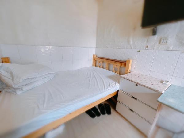 泰豪賓館 : photo 3 de la chambre chambre lit queen-size 