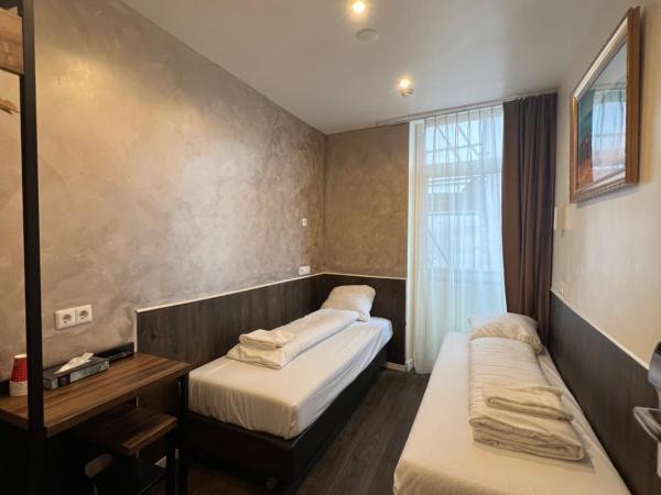 Orange Tulip Hotel : photo 1 de la chambre chambre lits jumeaux avec salle de bains privative