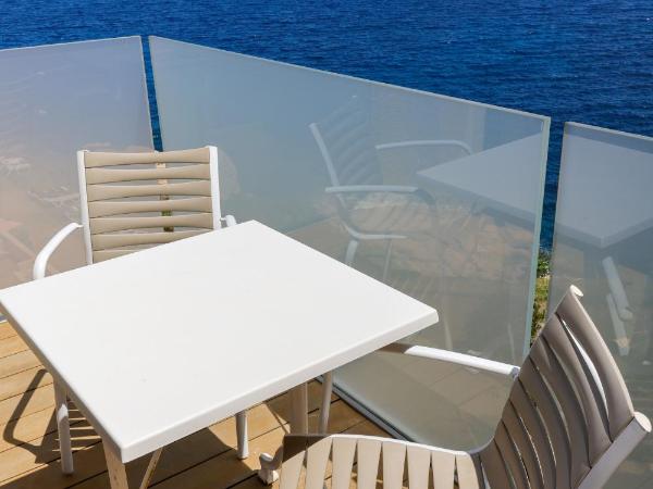 Hotel Saint Christophe : photo 2 de la chambre chambre quadruple - vue partielle sur mer