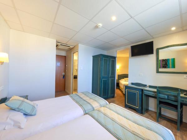 Hotel Saint Christophe : photo 10 de la chambre chambre triple standard - vue partielle sur mer
