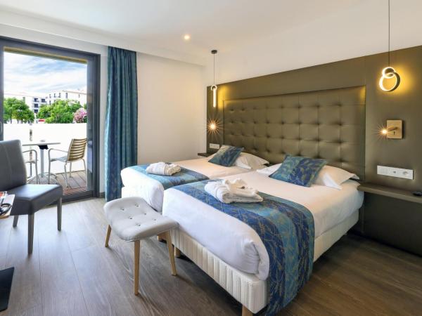 Hotel Saint Christophe : photo 8 de la chambre chambre lits jumeaux supérieure - vue sur jardin