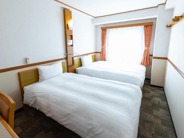 Toyoko Inn Niigata Furumachi : photo 1 de la chambre chambre lits jumeaux familiale - non-fumeurs
