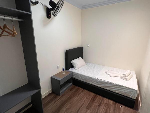 Hotel AL Amin : photo 2 de la chambre chambre simple avec salle de bains commune