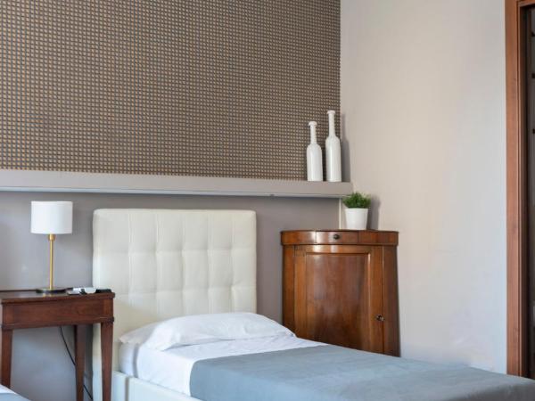 Casa di Sofia Città Alta : photo 1 de la chambre chambre triple avec salle de bains privative