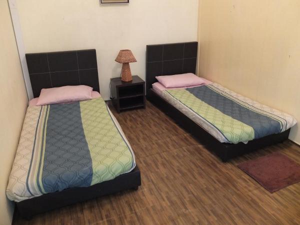 Muntri House : photo 4 de la chambre chambre lits jumeaux standard