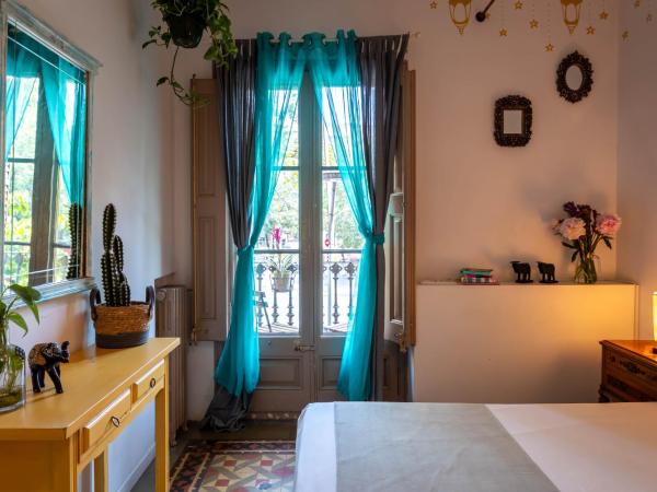 Primavera Hostel : photo 2 de la chambre chambre triple avec salle de bains commune