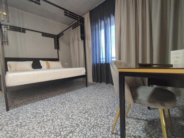 Hotel Nuvò : photo 8 de la chambre chambre double deluxe avec baignoire