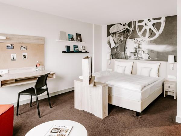 Vienna House Easy by Wyndham München : photo 7 de la chambre suite junior