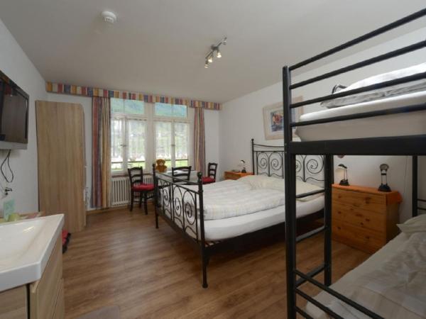 Swiss Lodge Hotel Bernerhof : photo 5 de la chambre chambre quadruple