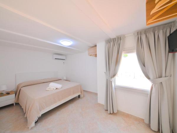 Villa Aida : photo 6 de la chambre appartement - vue sur jardin