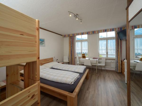 Swiss Lodge Hotel Bernerhof : photo 6 de la chambre chambre quadruple