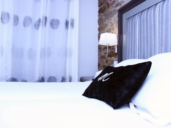 Hotel Montenegro Compostela : photo 6 de la chambre chambre lits jumeaux