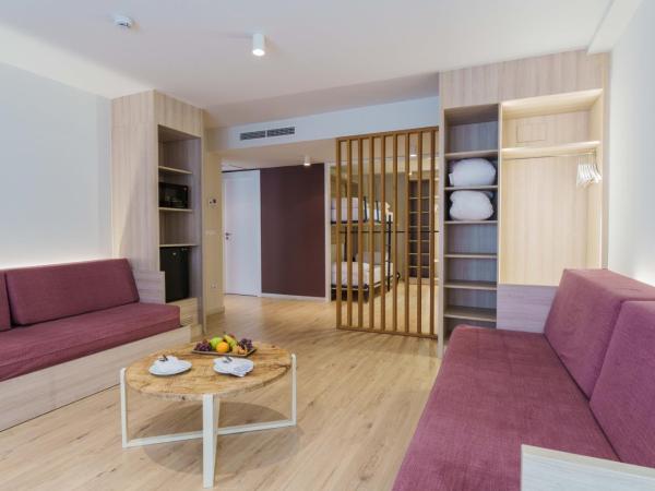 Hotel & Aparthotel Cosmos : photo 1 de la chambre chambre familiale deluxe